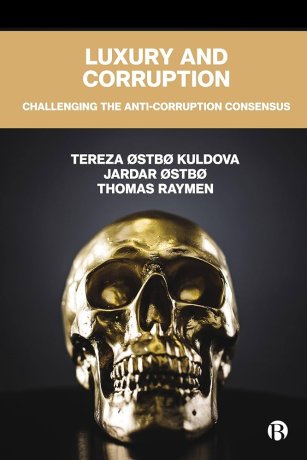 Book front: a guilded skull on black background